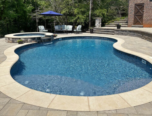 Gorgeous Hardscaped Haven featuring a Pool as its Centerpiece